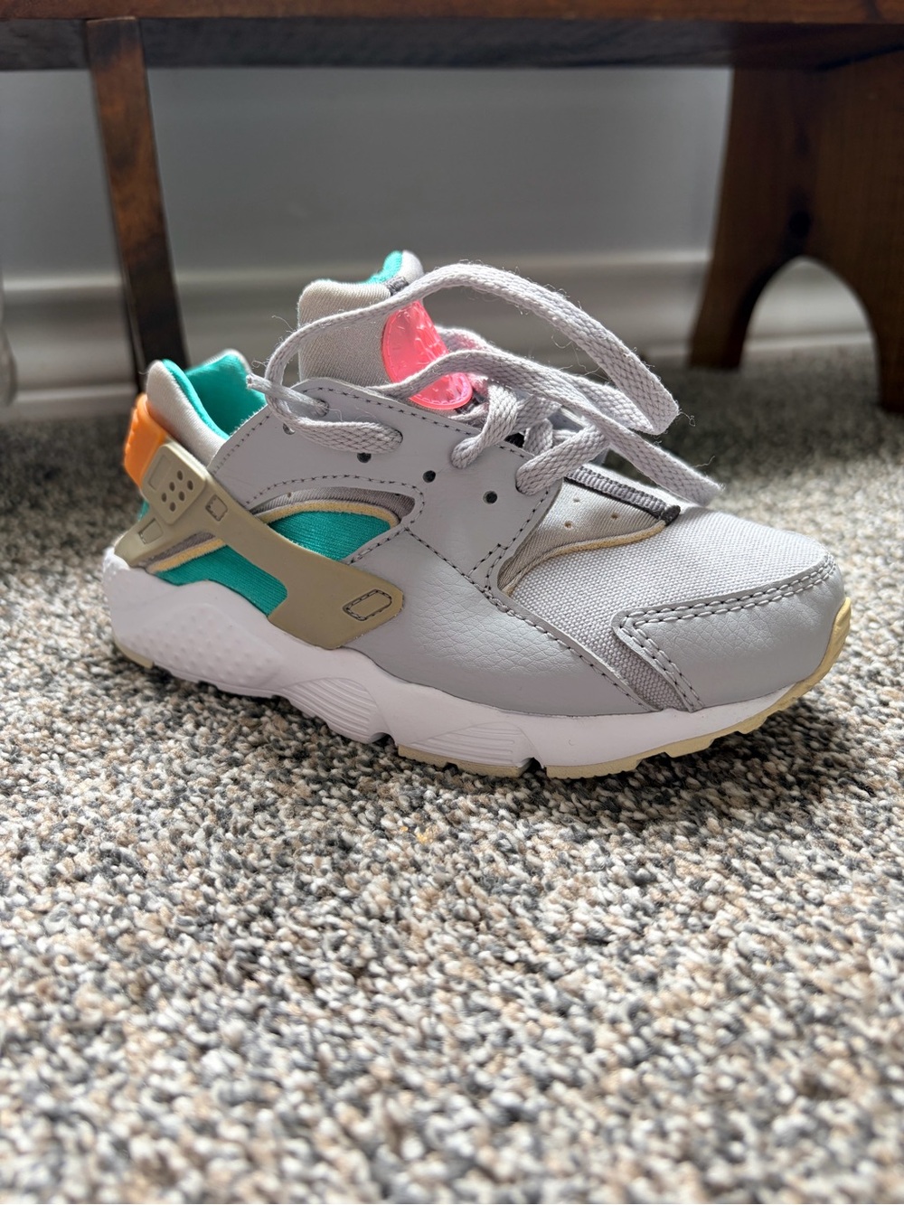 Kids Gray and Teal Nike Athletic Sneakers with Pink Accent